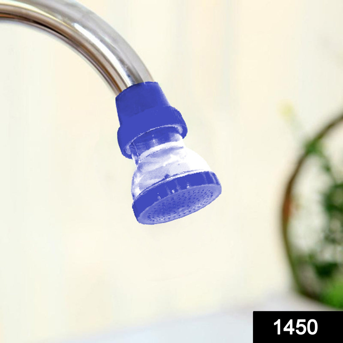 Compact plastic 360-Degree Shower Head attached to a tap, showing its flexible design.