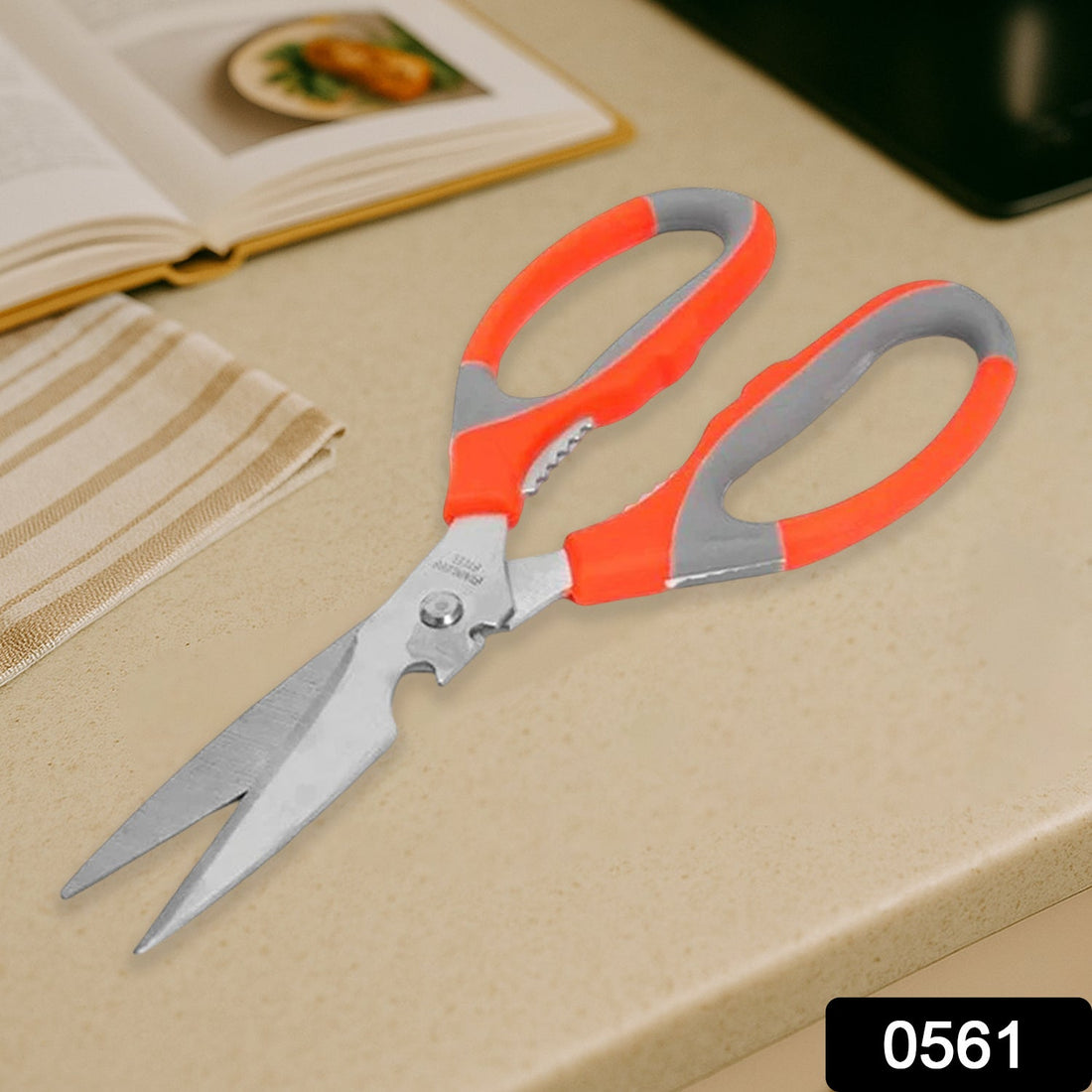 Multi-function kitchen scissors with a magnetic sheath for safe storage on a kitchen counter.