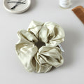 Fabric hair scrunchie designed for minimal and elegant hairstyles