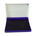 Durable ink stamp pad in casing, ensuring long-lasting performance.