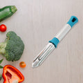 Apex stainless steel peeler displayed on kitchen countertop