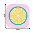 Bright yellow lemon silicone drink coaster displayed on coffee table
