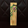 Angled view highlighting bamboo toothbrush with medium bristles