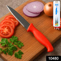 Sharp serrated kitchen knife slicing tomato easily