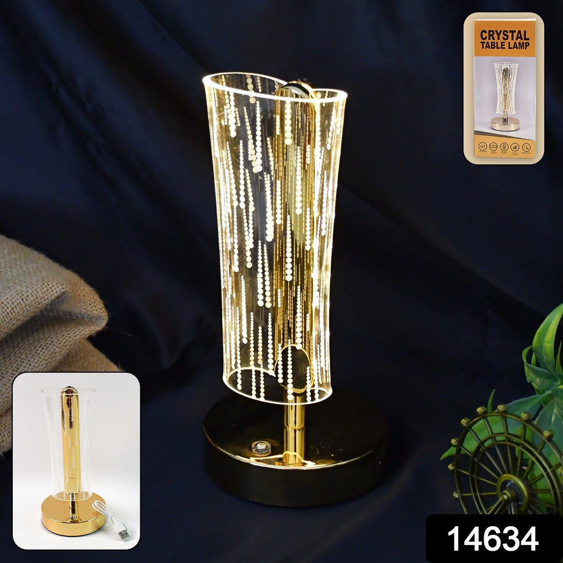 Crystal table lamp with cylindrical crystal-cut shade and golden base