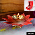 Close-up of lotus shaped brass oil diya showing polished brass bowl