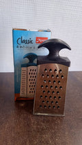 Close-up of stainless steel blades on 4-in-1 kitchen grater and slicer