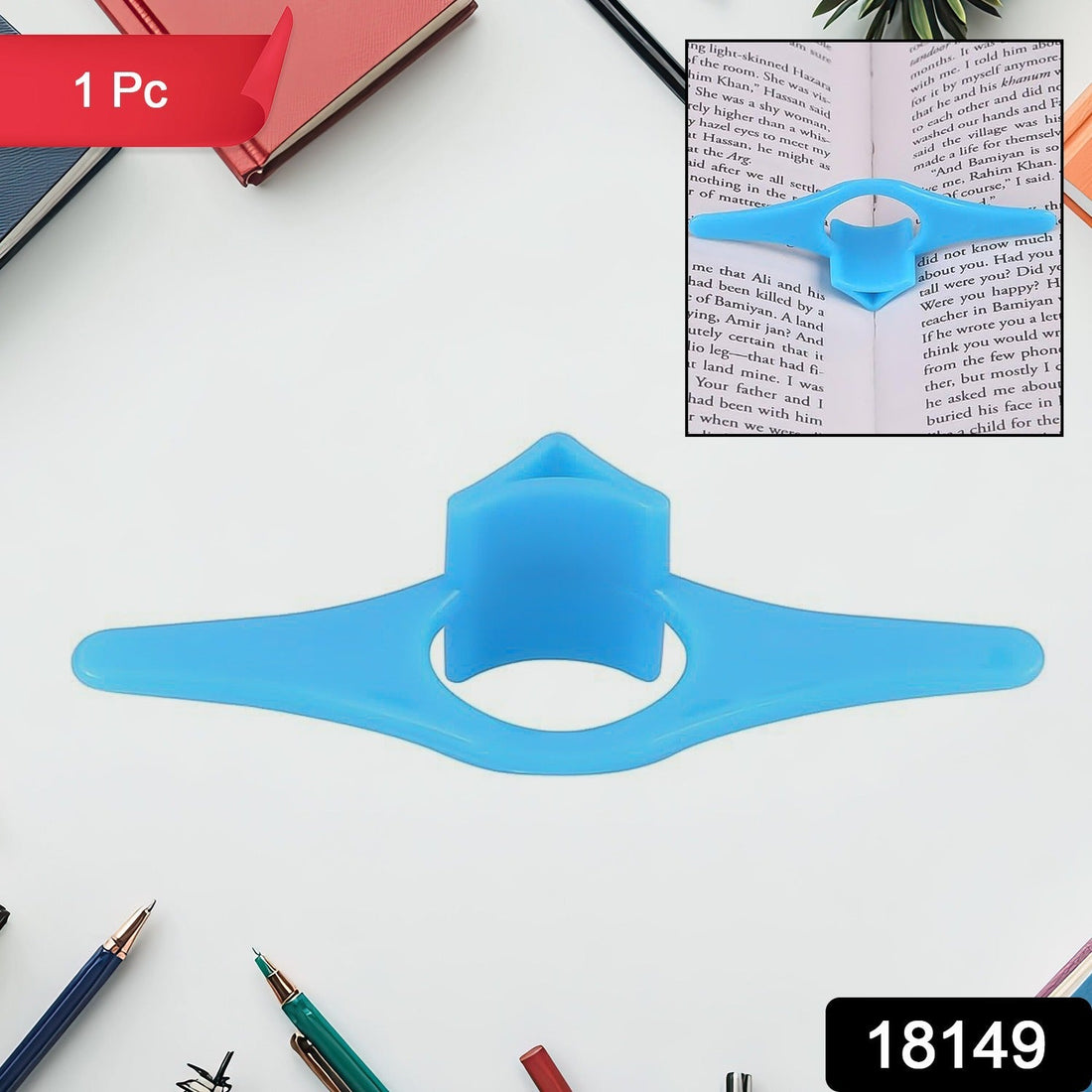 Plastic thumb book support holding a paperback open for easy reading.