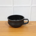 Large capacity deep handle bowl in actual use with food