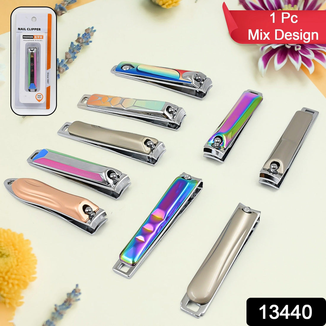 AuriGlam folding nail clippers made from stainless steel, with a sleek, portable design.