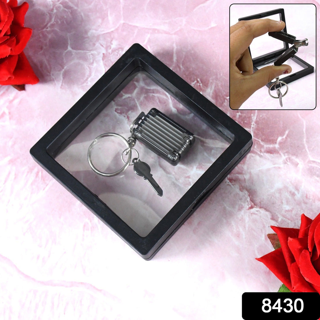 Portable nail clipper keychain with 3D floating frame display case by AuriGlam