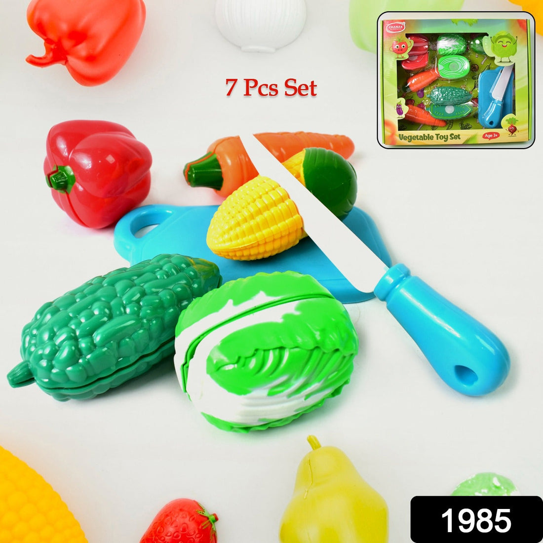 Child's hands slicing a toy banana on a cutting board from the Slice & Play Toy Set.