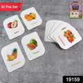 Children playing and learning with fruit flashcards in a classroom setting