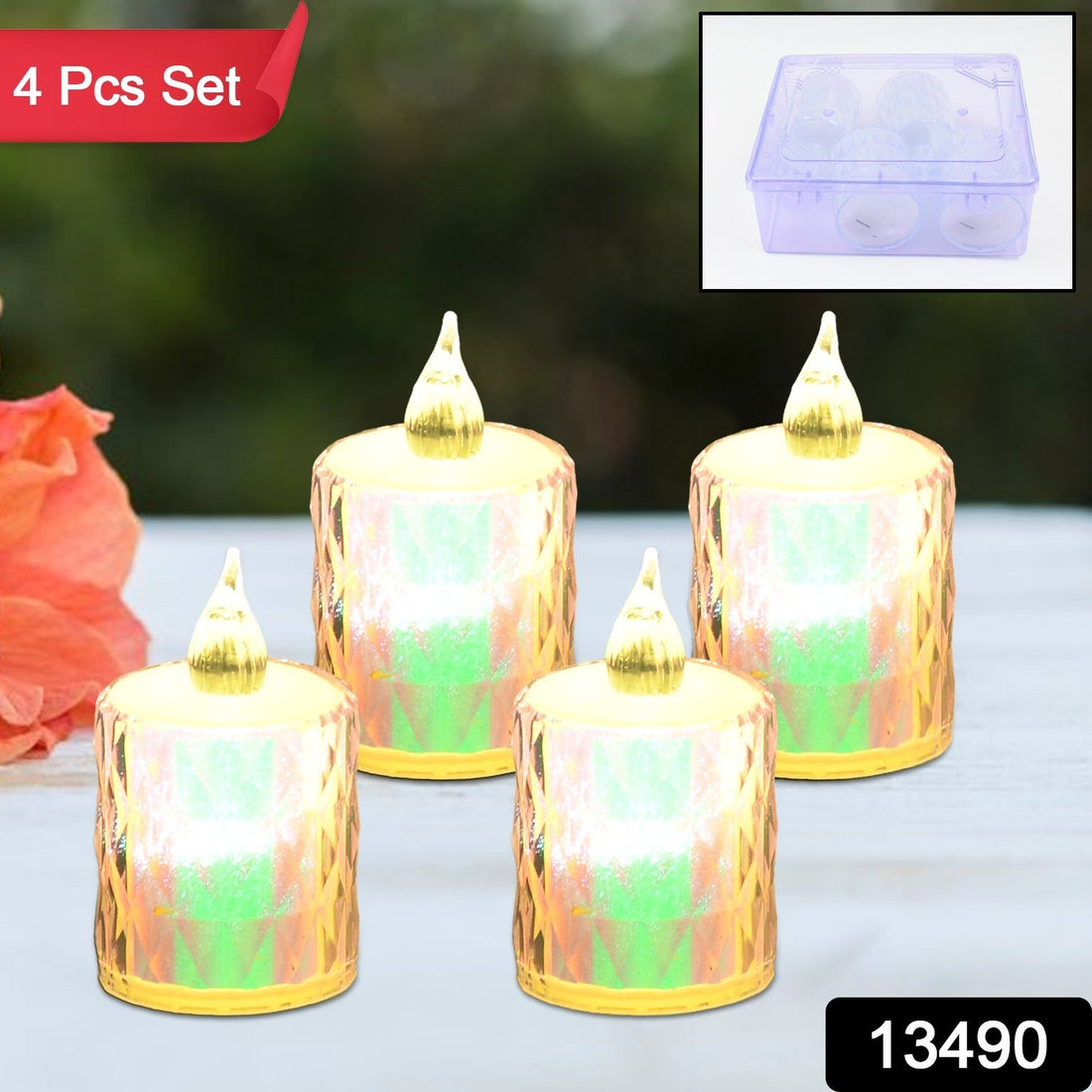A set of four flickering flameless LED candles arranged on a surface, ideal for home decor.