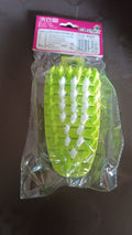 Plastic cleaning brush for fruits and vegetables in kitchen