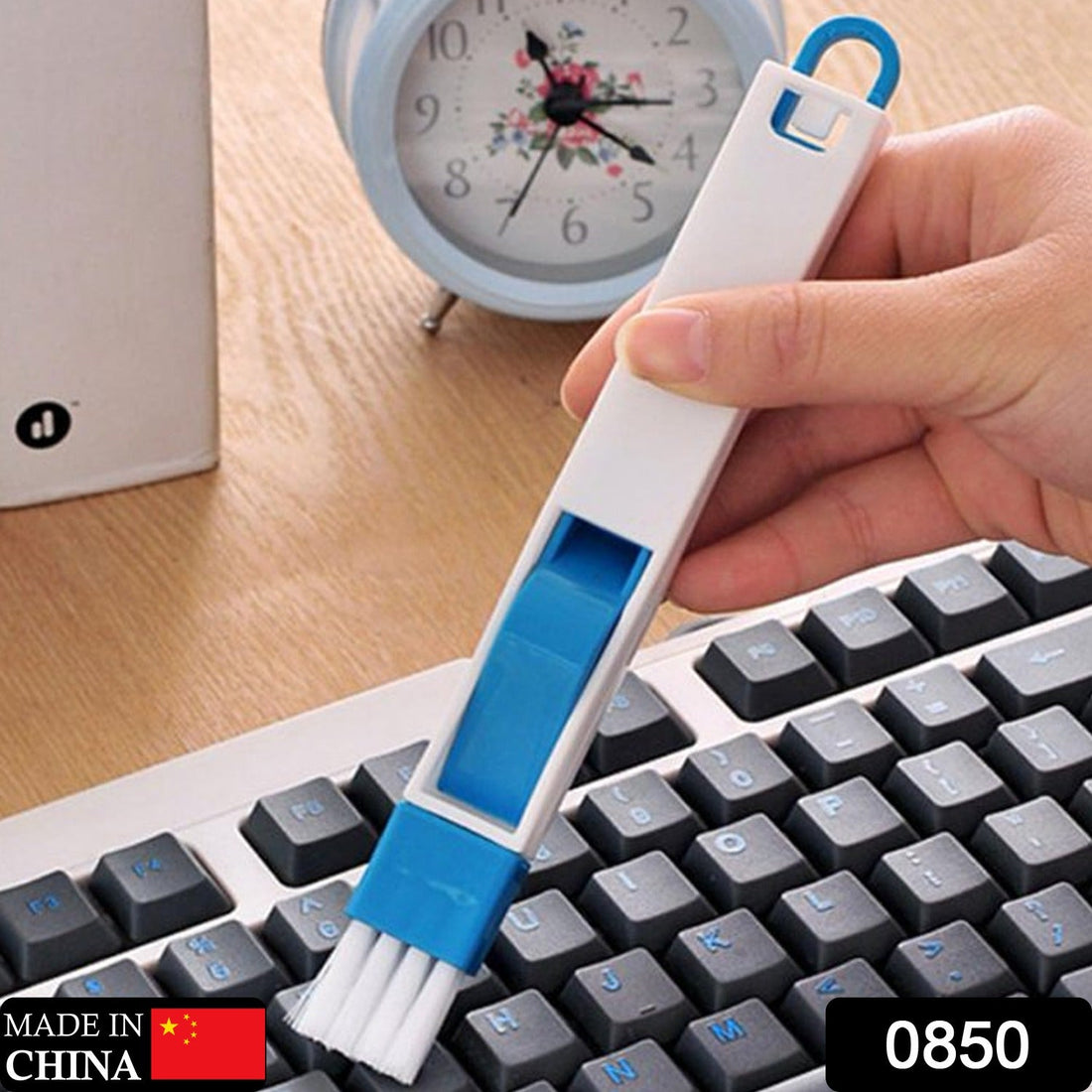 A multi-functional window slot cleaning brush with an integrated dustpan, ready for use.
