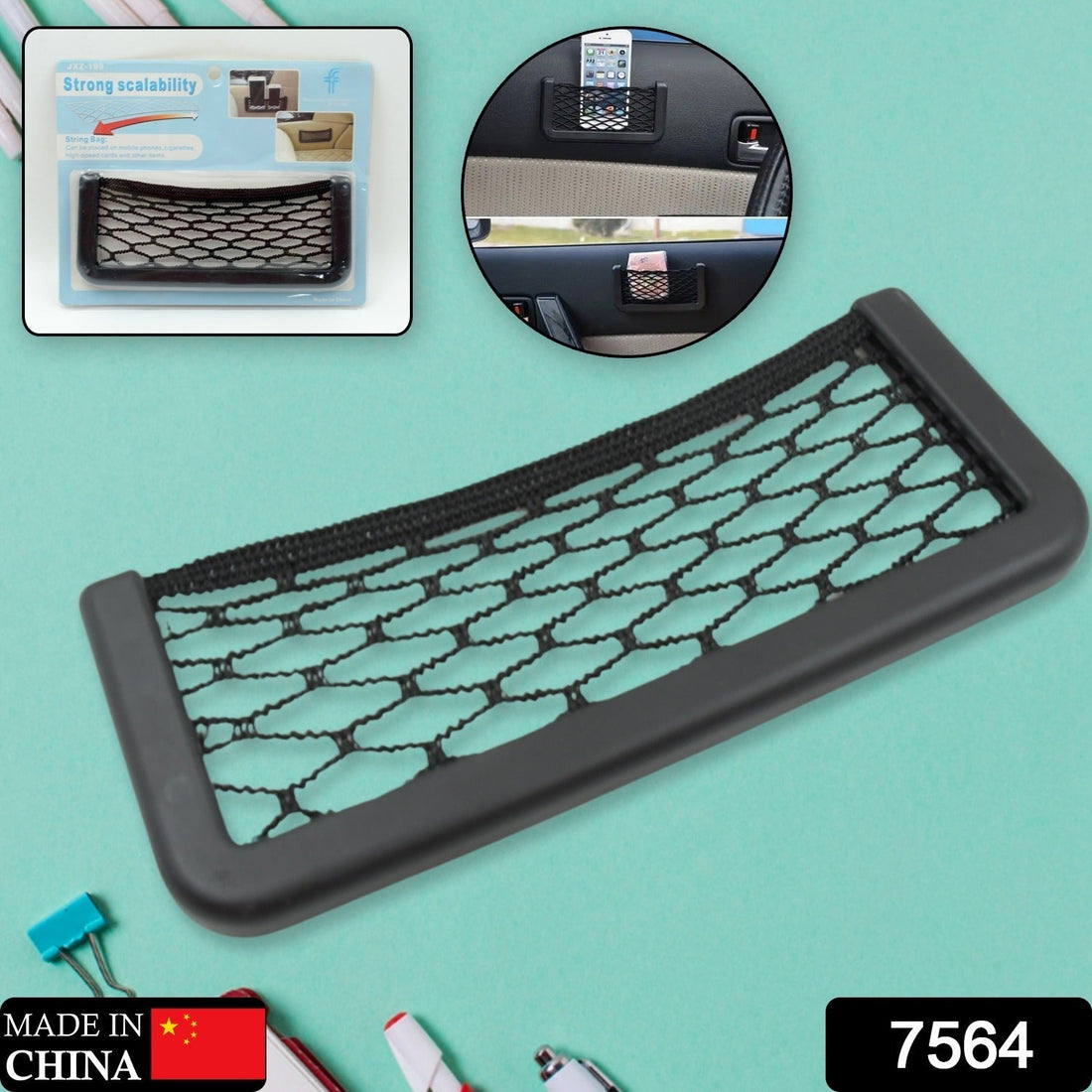 Car seat organizer mesh attached to the side of a car seat, holding a phone.
