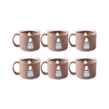 Tea cup set displayed on kitchen counter, ready for use