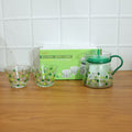 Transparent tea pot with matching cups, ideal for hot tea serving