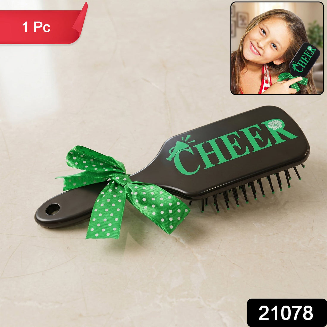 Kids printed hair brush with cute ribbon bow handle, soft bristles for gentle detangling.