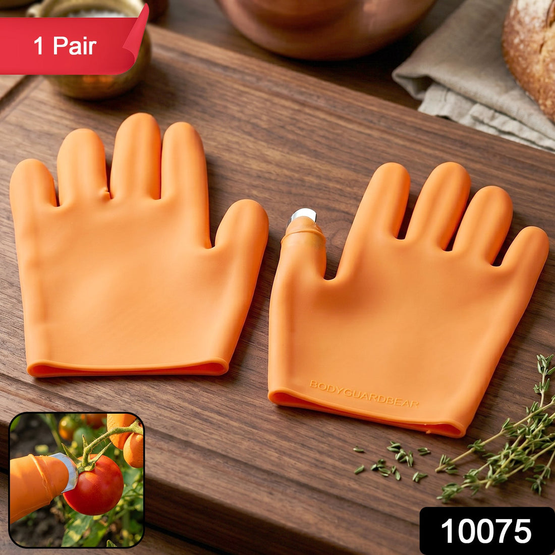 Bright orange silicone gloves with built-in finger protector for safety during food prep